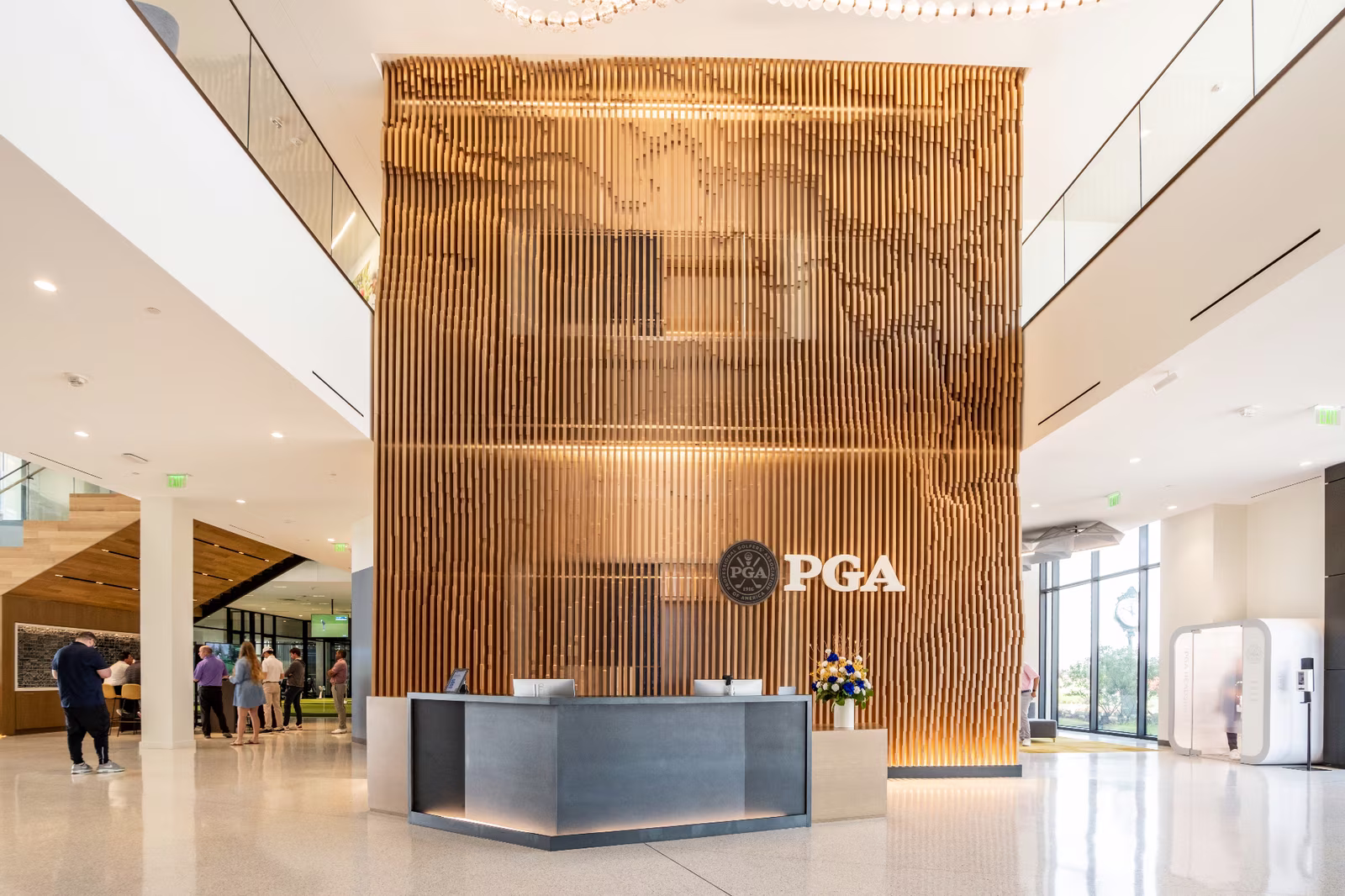 PGA Headquarters lobby — full view with chandelier and wall installation